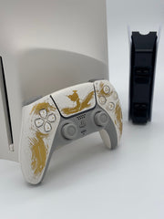 Mobile2fix PlayStation 5 Ghost of Yotei Special Edition console and DualSense controller with gold brush art