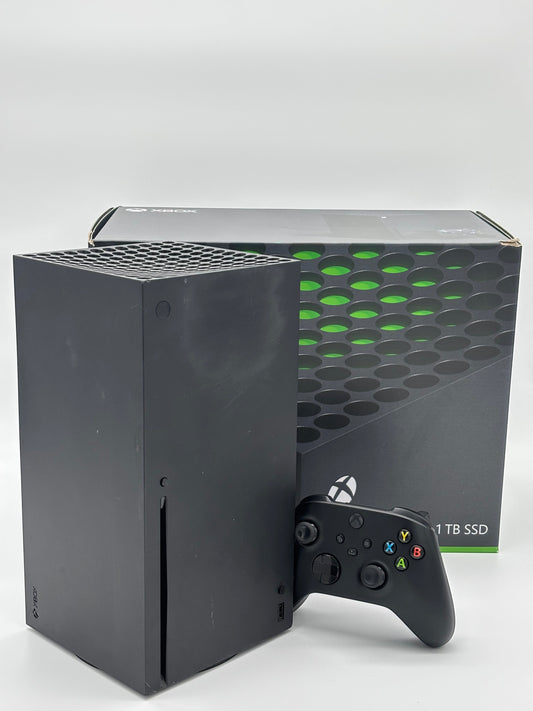 Mobile2fix pre-owned black Xbox Series X console with controller and original retail box on a white background