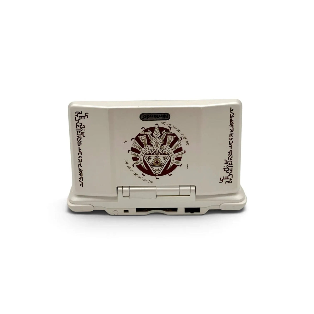 Mobile2fix limited edition off-white Nintendo DS Lite console with Legend of Zelda Hylian artwork on the lid