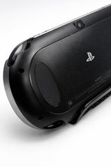 Mobile2fix black Sony PlayStation PS Vita PCH-1000 handheld console, rear view showing camera and logo detail.